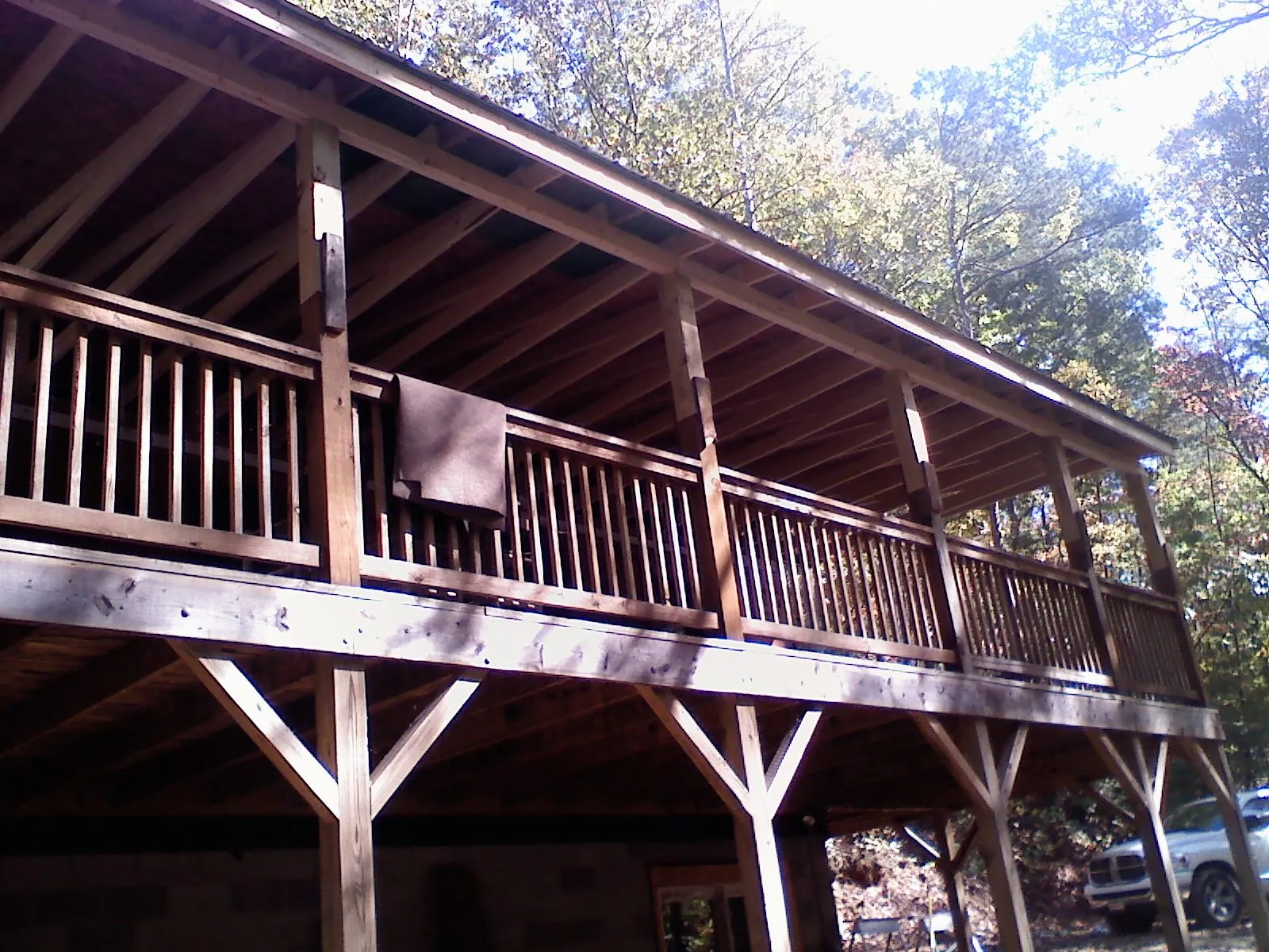 Timber framing under a new elevated porch and deck — Roof Leak Repair in Dewey by Roofing Brothers